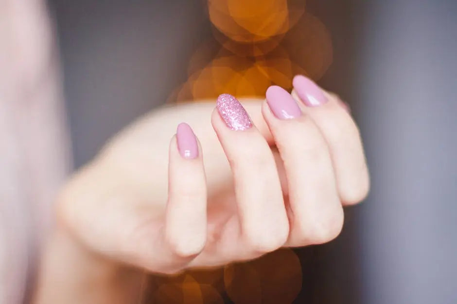 Woman with pink GelX nails at InnoVitale Spa